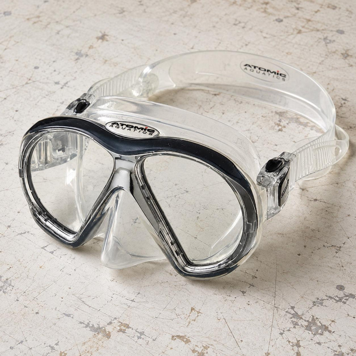 Open Box Atomic Aquatics SubFrame Mask, Medium Fit — Clear/Black, open box, lightly used on off-white work table