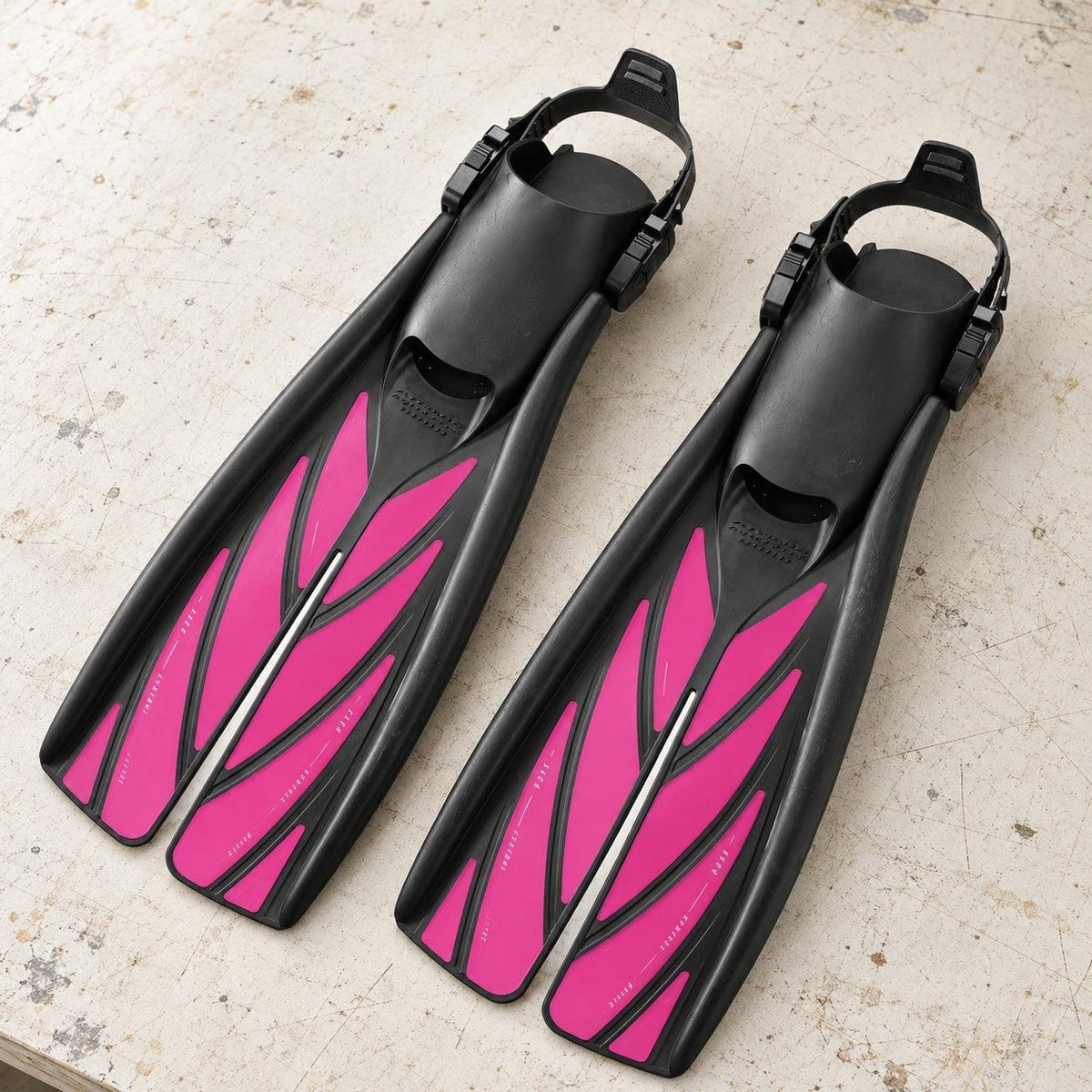 Open Box Atomic Aquatics Open Heel Fin — Pink, open box, lightly used on off-white work table