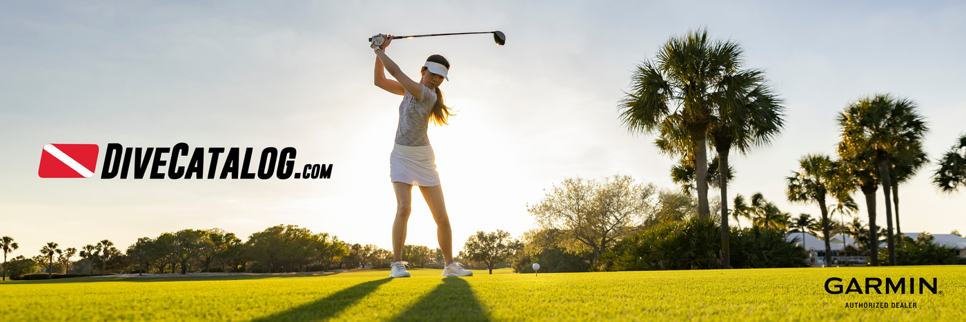 Woman playing golf with DiveCatalog.com and Garmin logos in the background