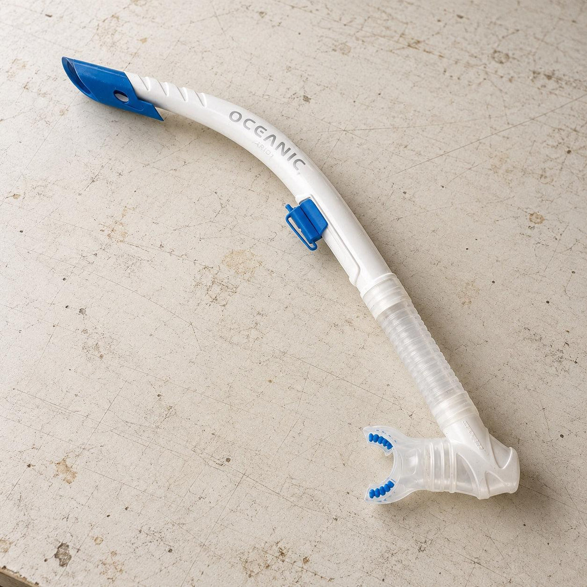 Open Box Oceanic Arid Snorkel — Blue/Clear, open box, lightly used on off-white work table