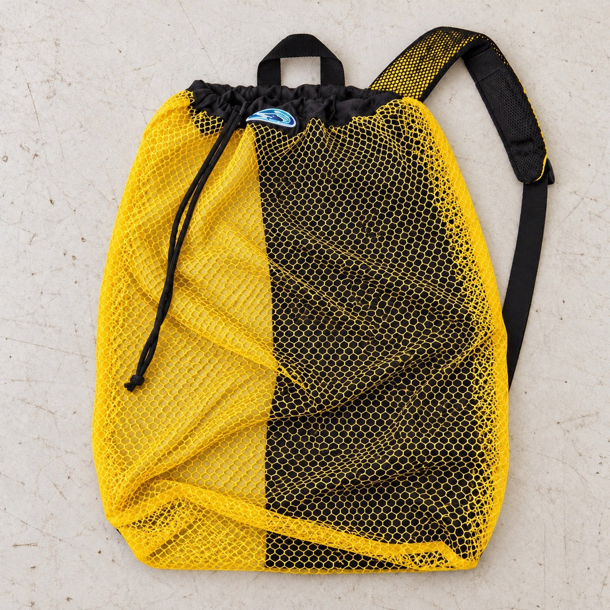 Open Box Stahlsac B.V.I. Mesh Backpack — Yellow — open-box overhead flat lay