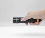 OrcaTorch D710 dive light in hand