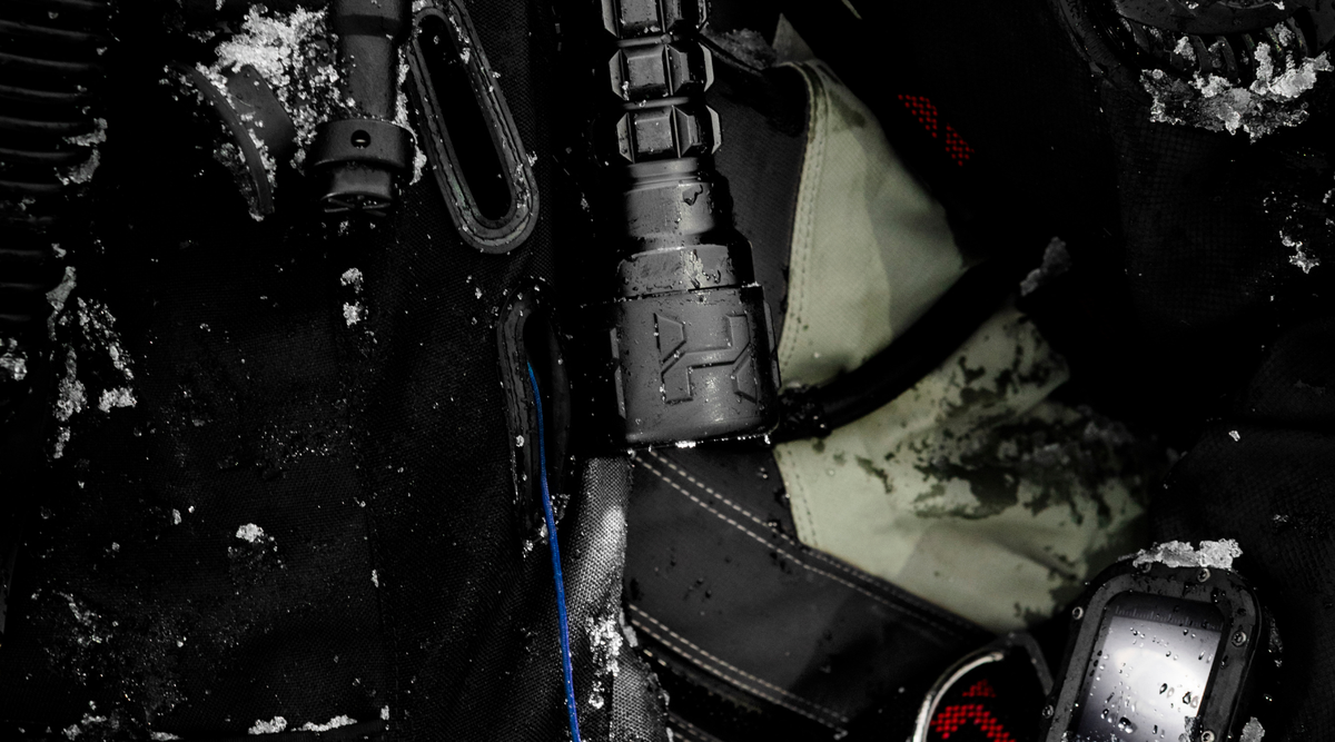 Halcyon Photon dive light clipped to harness