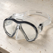 Open Box Atomic Aquatics SubFrame Mask — Clear/Black, open box, lightly used on off-white work table