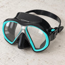 Open Box Atomic Aquatics SubFrame Mask — Black/Aqua, open box, lightly used on off-white work table