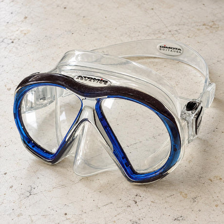 Open Box Atomic Aquatics SubFrame Mask, Medium Fit — Clear/Blue, open box, lightly used on off-white work table
