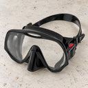 Open Box Atomic Aquatics Frameless Mask — Black, open box, lightly used on off-white work table