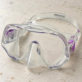 Open Box Atomic Aquatics Frameless Mask — Clear/Purple, open box, lightly used on off-white work table