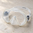 Open Box Atomic Aquatics Frameless 2 Mask — Clear, open box, lightly used on off-white work table