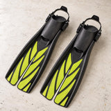 Open Box Atomic Aquatics Open Heel Fin — Yellow, open box, lightly used on off-white work table