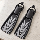 Open Box Atomic Aquatics Open Heel Fin — Silver, open box, lightly used on off-white work table