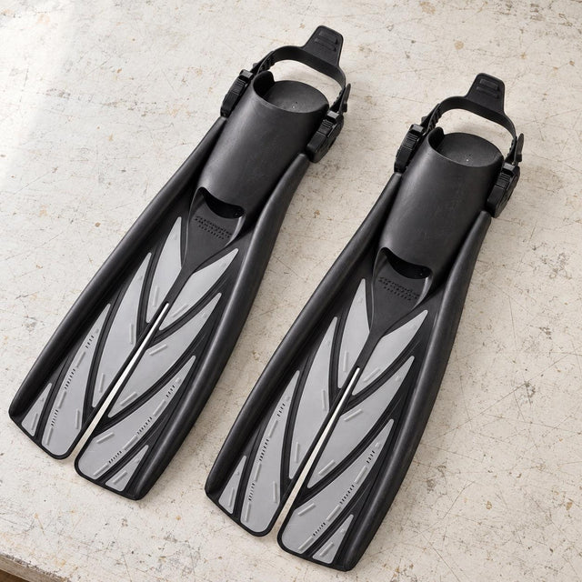 Open Box Atomic Aquatics Open Heel Fin — Silver, open box, lightly used on off-white work table