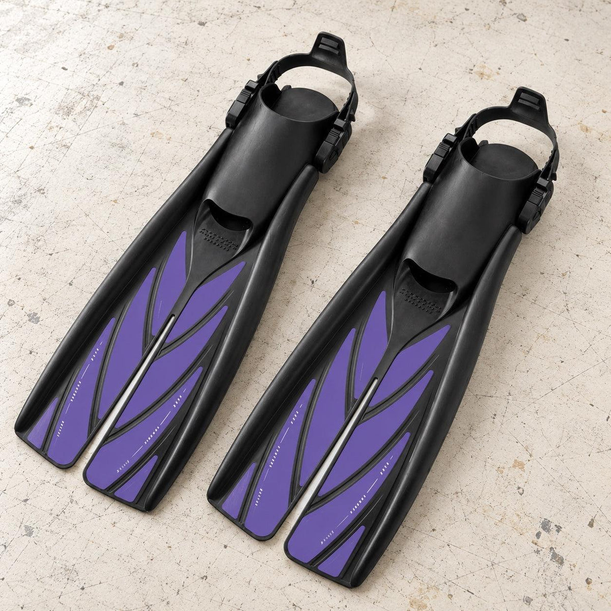 Open Box Atomic Aquatics Open Heel Fin — Purple, open box, lightly used on off-white work table