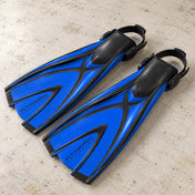 Open Box Atomic Aquatics X1 Fins — Blue, open box, lightly used on off-white work table
