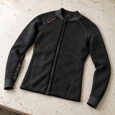 Open Box Bare EXOWEAR Jacket Mens — Black, open box, lightly used on off-white work table