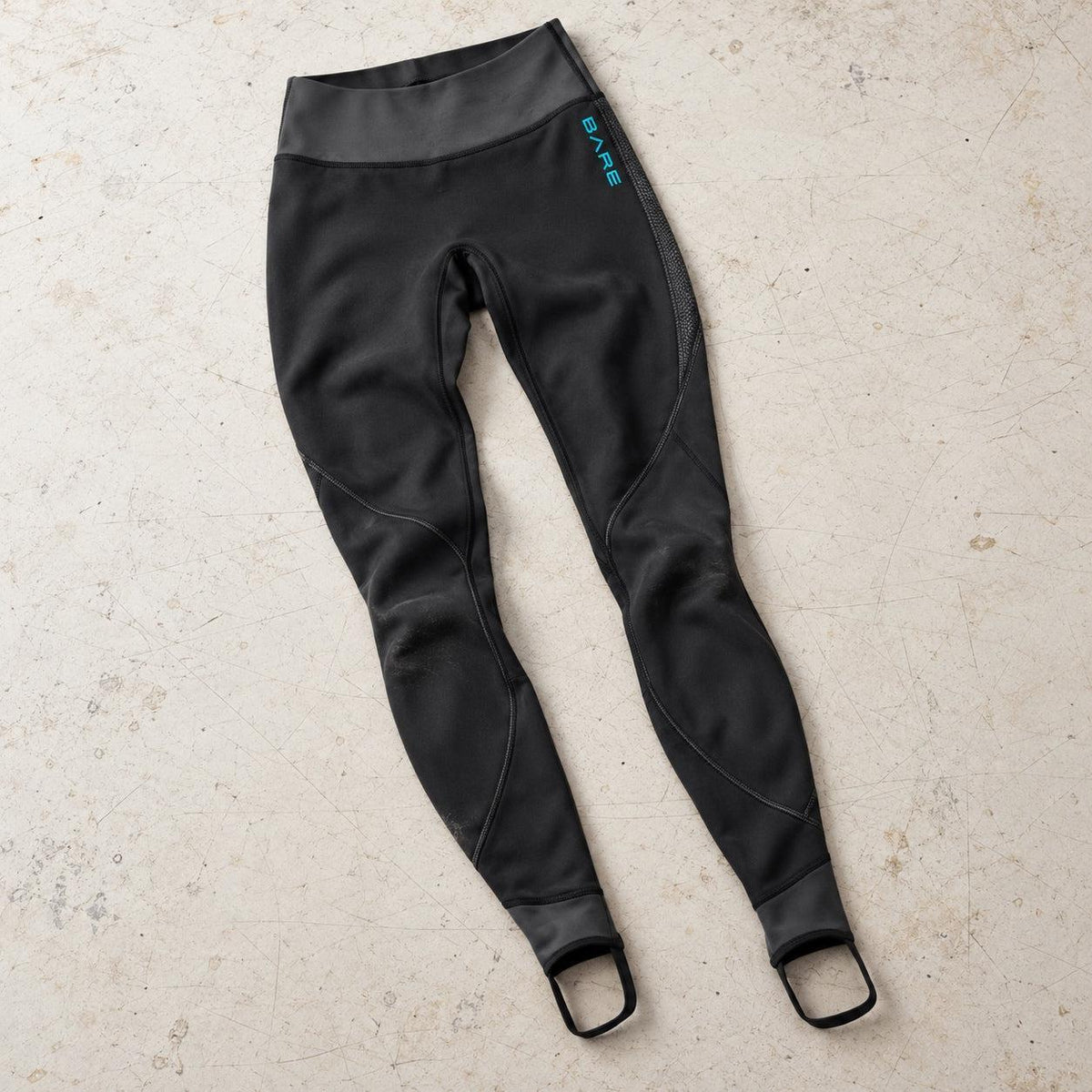 Open Box Bare EXOWEAR Pants Womens — Black, open box, lightly used on off-white work table