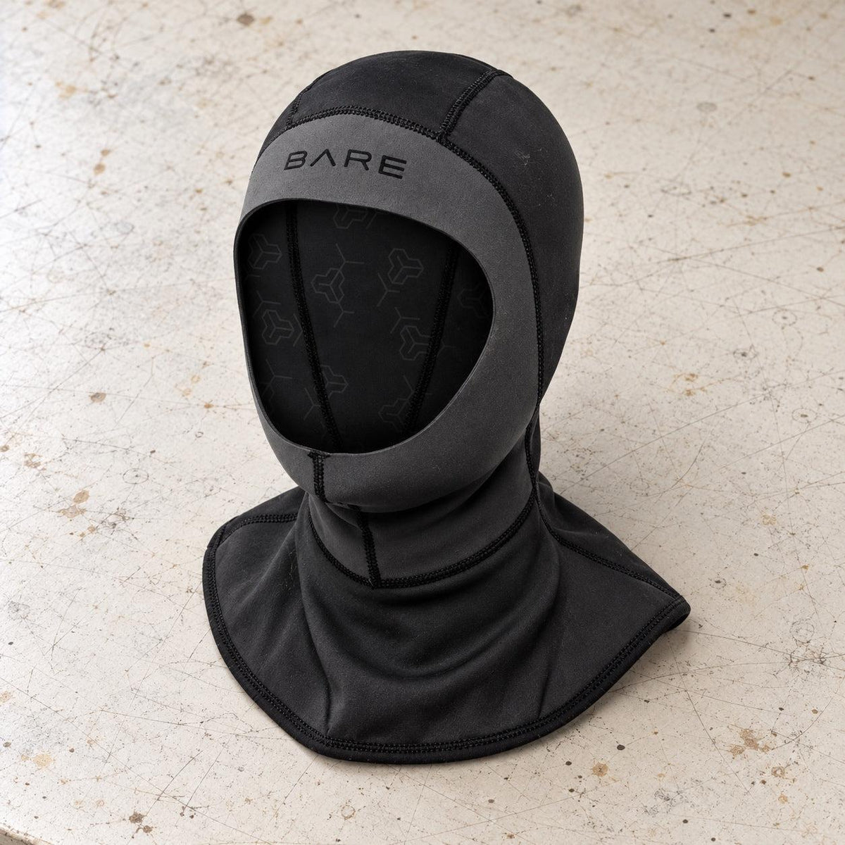 Open Box Bare 2 MM Exowear Unisex Hood — default, open box, lightly used on off-white work table