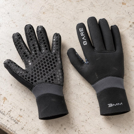 Open Box Bare 3mm Ultrawarmth Dive Gloves — Black, open box, lightly used on off-white work table