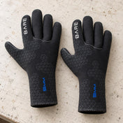 Open Box Bare 5mm S-Flex Dive Gloves — Black, open box, lightly used on off-white work table