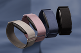 Garmin CIRQA Smart Band worn on wrist — screenless health and fitness tracker lifestyle