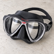 Open Box Hollis M-3 Frameless Mask — Black, open box, lightly used on off-white work table