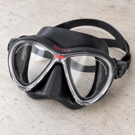 Open Box Hollis M-3 Frameless Mask — Black, open box, lightly used on off-white work table