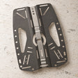 Open Box Hollis Stainless Steel Backplate 2.0 BCD Accessory — default, open box, lightly used on off-white work table