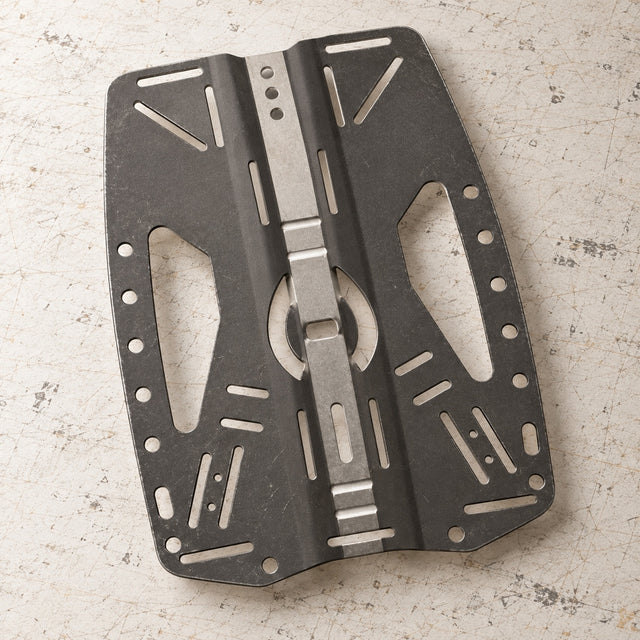 Open Box Hollis Stainless Steel Backplate 2.0 BCD Accessory — default, open box, lightly used on off-white work table
