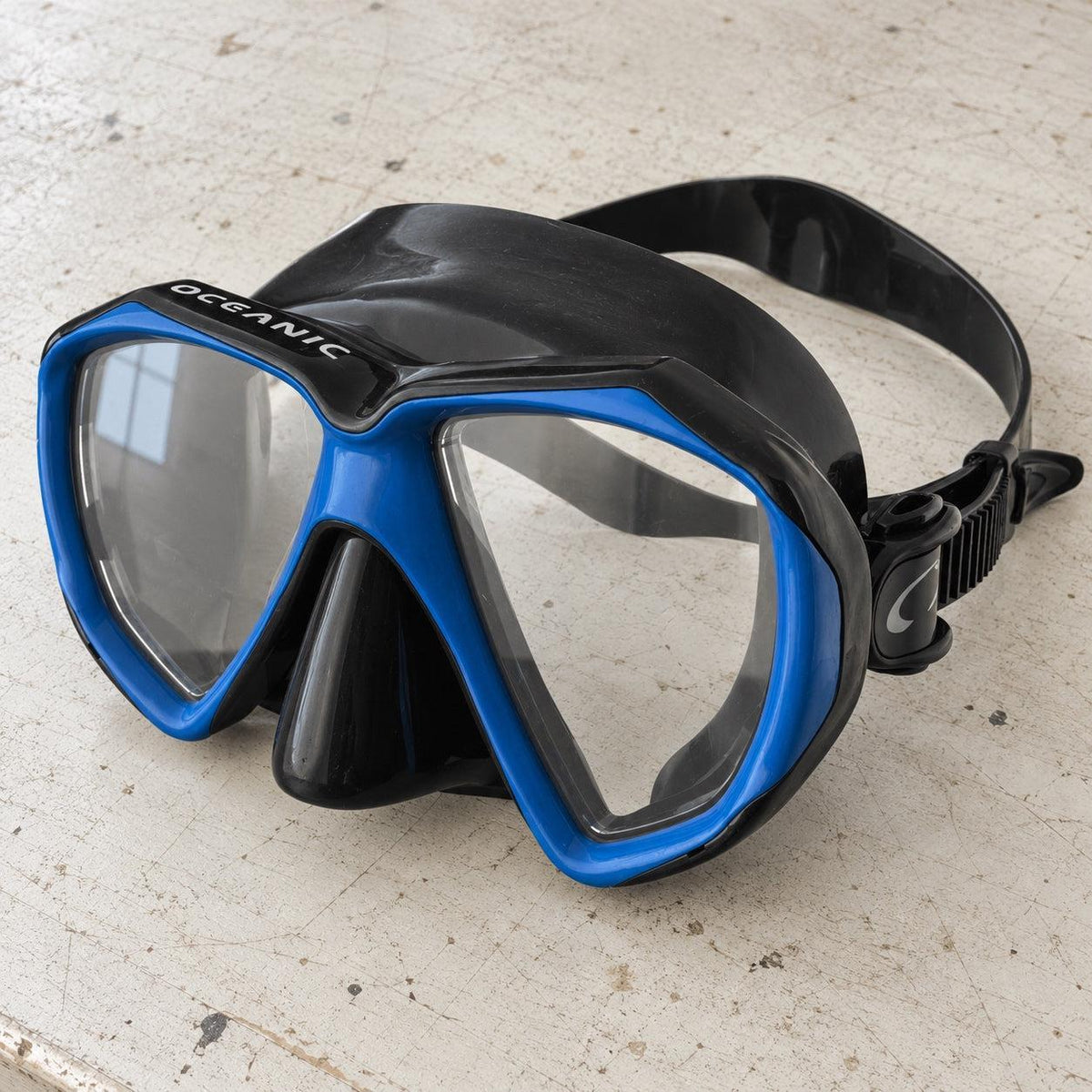 Open Box Oceanic Duo Mask — BK/Blue, open box, lightly used on off-white work table