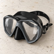 Open Box Oceanic Duo Mask — Black/Titanium, open box, lightly used on off-white work table