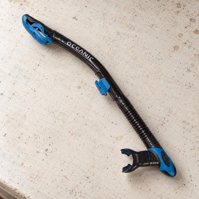 Open Box Oceanic Ultra Dry Snorkel — Black/Blue, open box, lightly used on off-white work table
