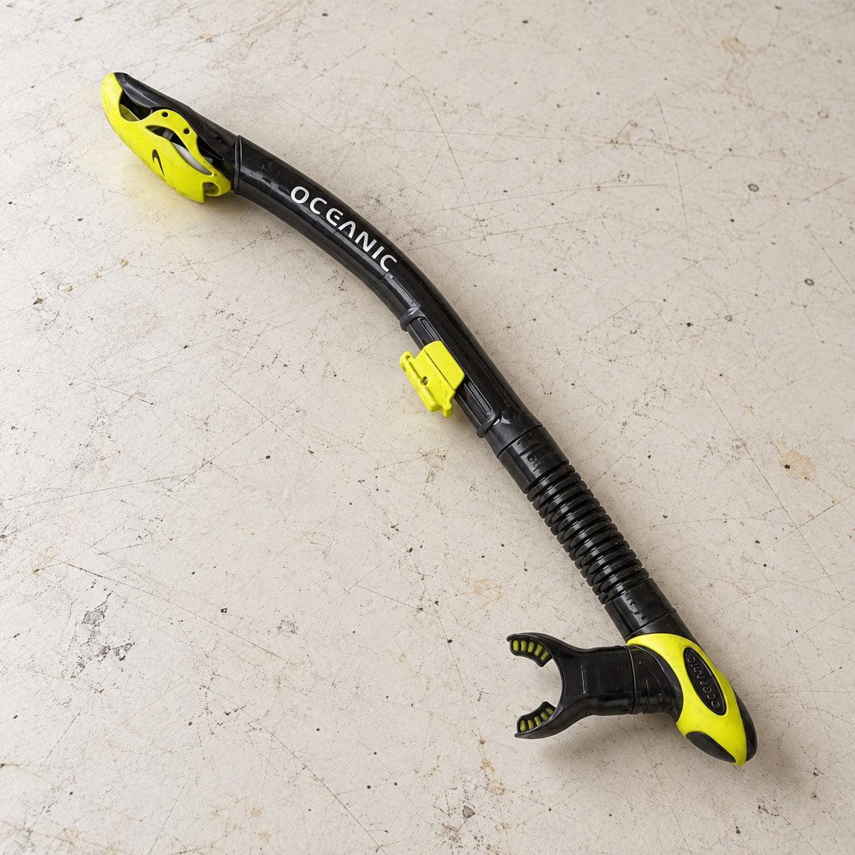 Open Box Oceanic Ultra Dry Snorkel — Black/Yellow, open box, lightly used on off-white work table