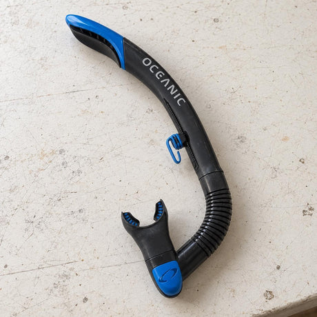Open Box Oceanic Ultra SD Snorkel — Black/Blue, open box, lightly used on off-white work table