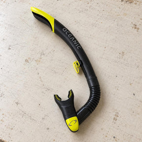 Open Box Oceanic Ultra SD Snorkel — Black/Yellow, open box, lightly used on off-white work table