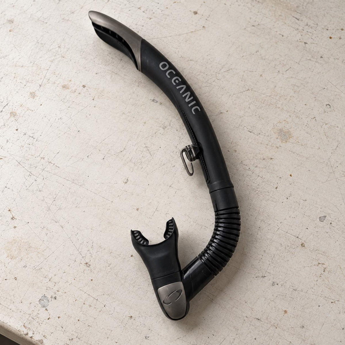 Open Box Oceanic Ultra SD Snorkel — Black/Titanium, open box, lightly used on off-white work table
