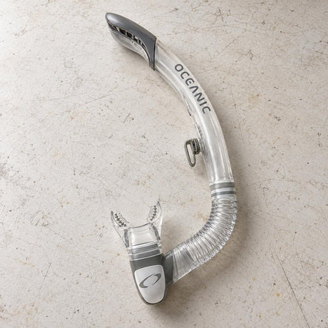 Open Box Oceanic Ultra SD Snorkel — Clear/Titanium, open box, lightly used on off-white work table