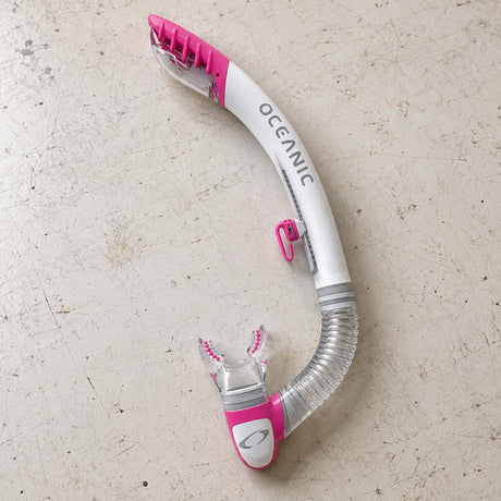 Open Box Oceanic Ultra Dry 2 Snorkel — White/Pink, open box, lightly used on off-white work table