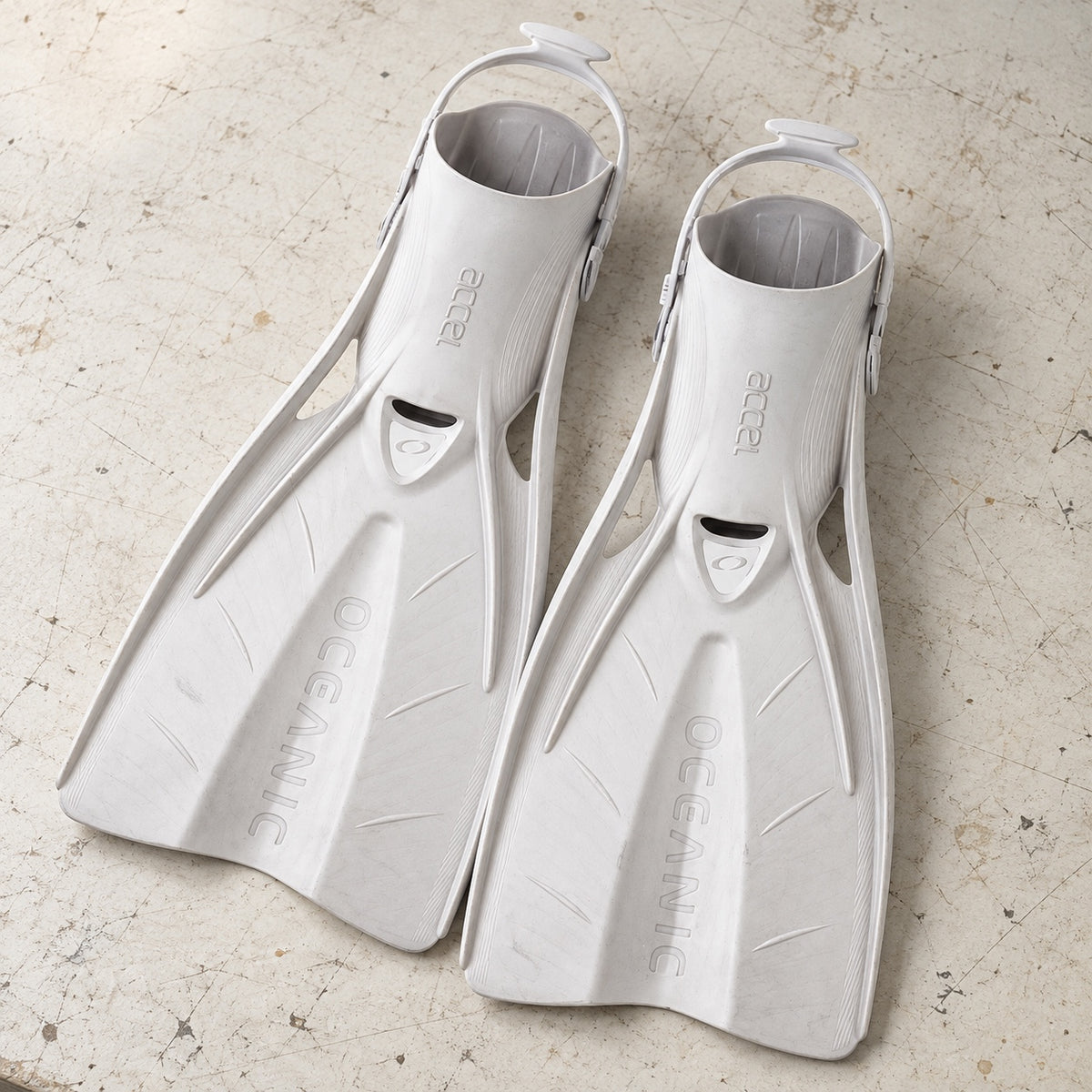 Open Box Oceanic Accel Fin — White, open box, lightly used on off-white work table