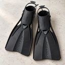 Open Box Oceanic Accel Fin — Black, open box, lightly used on off-white work table