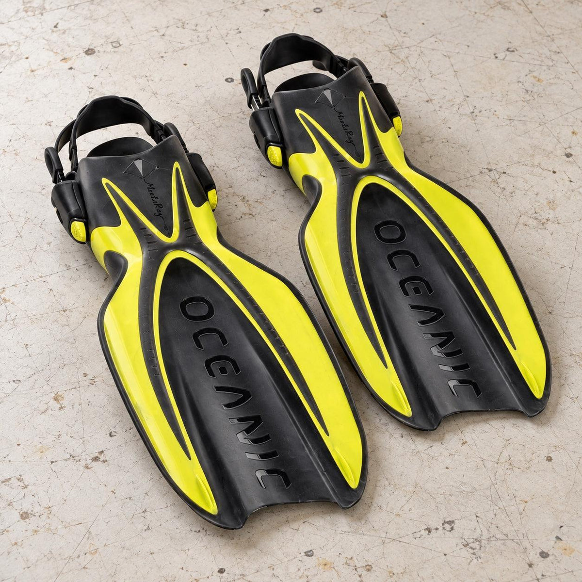 Open Box Oceanic Manta Ray Fin — Yellow/Black, open box, lightly used on off-white work table