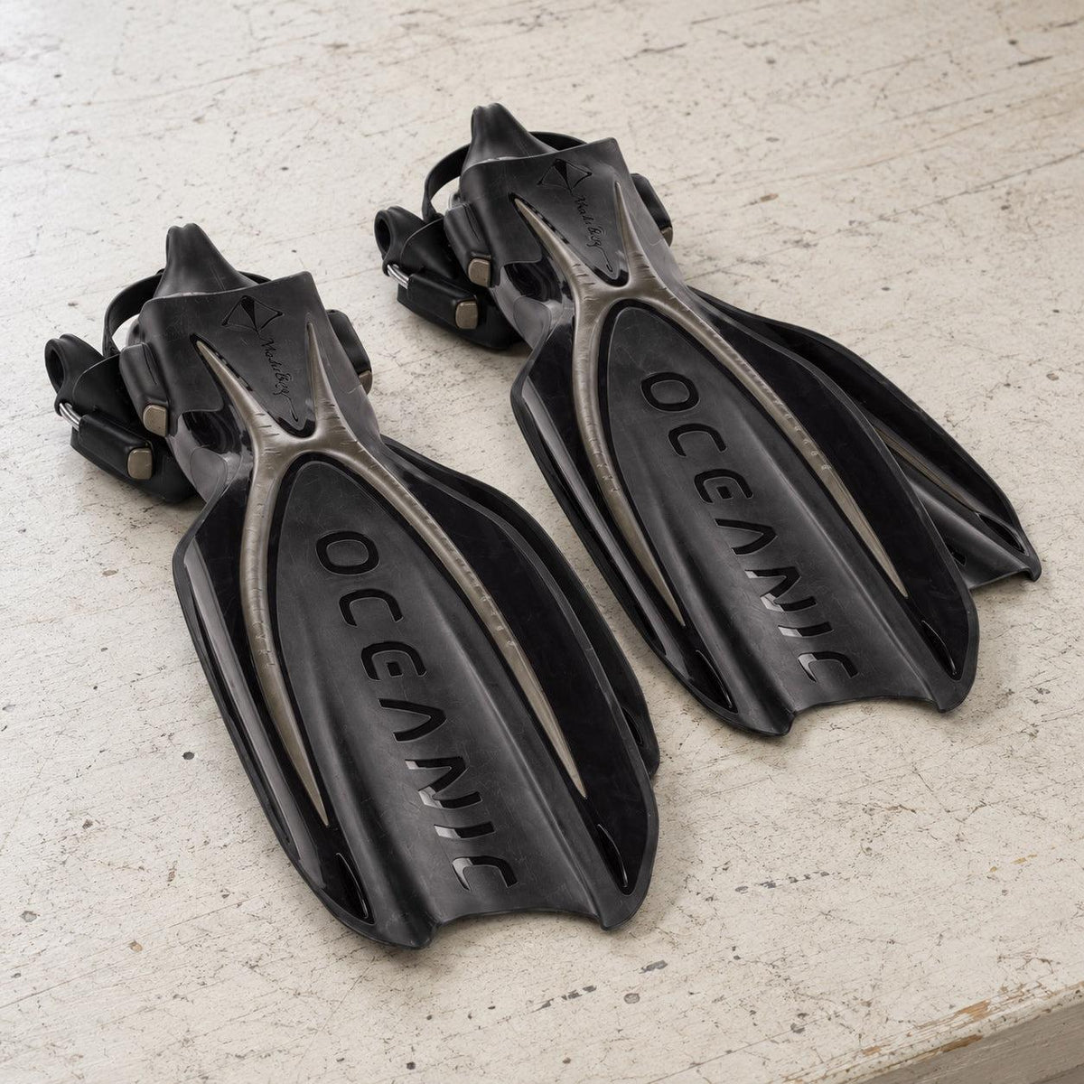 Open Box Oceanic Manta Ray Fin — Titanium/Black, open box, lightly used on off-white work table