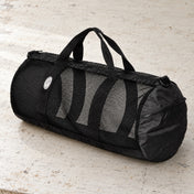 Open Box Stahlsac 26 Mesh Duffle — Black, open box, lightly used on off-white work table
