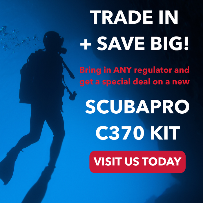 Scuba diver in blue water with promotional text for Scubapro C370 kit.