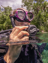 Diver at the surface holding the Sherwood SR3 Regulator second stage
