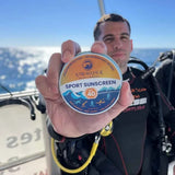 Diver with Stream2Sea SPF 40 sunscreen tin