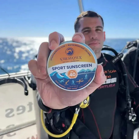 Diver with Stream2Sea SPF 40 sunscreen tin